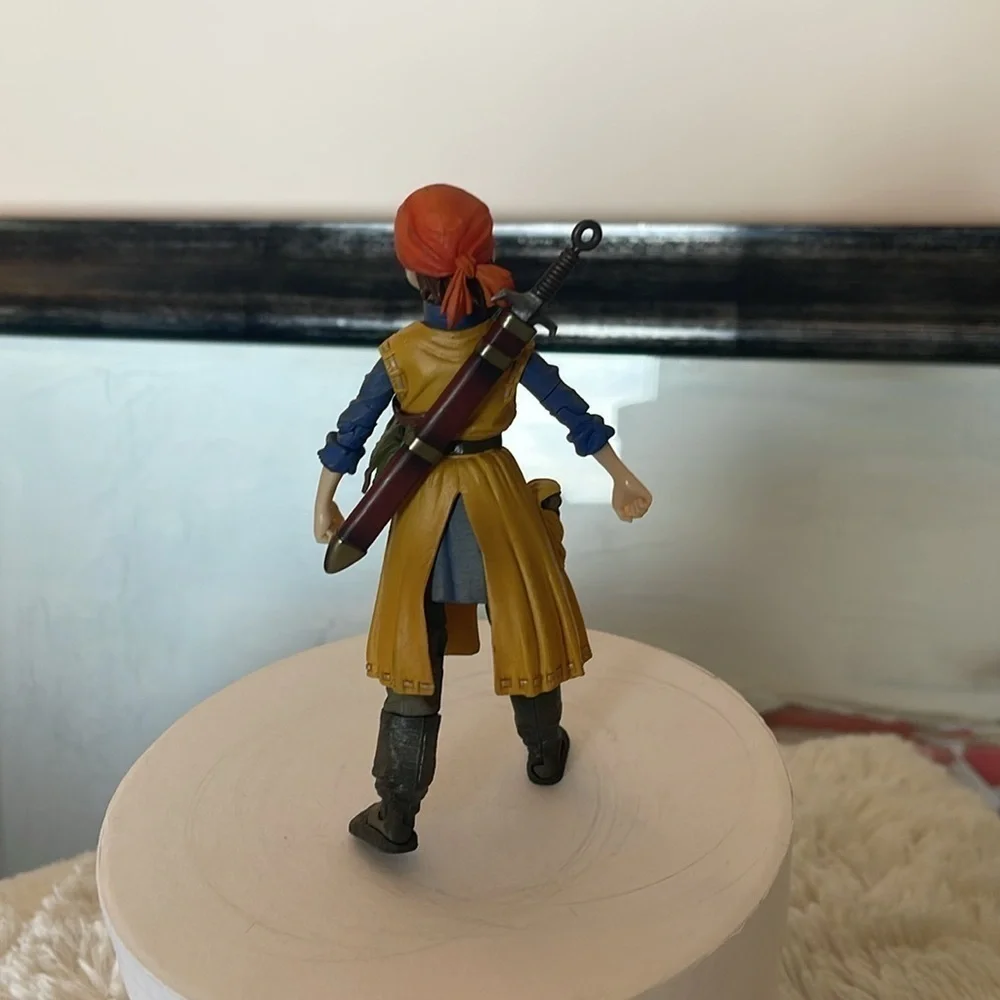 Adventure Figure with Yellow Coat and Red Hat
